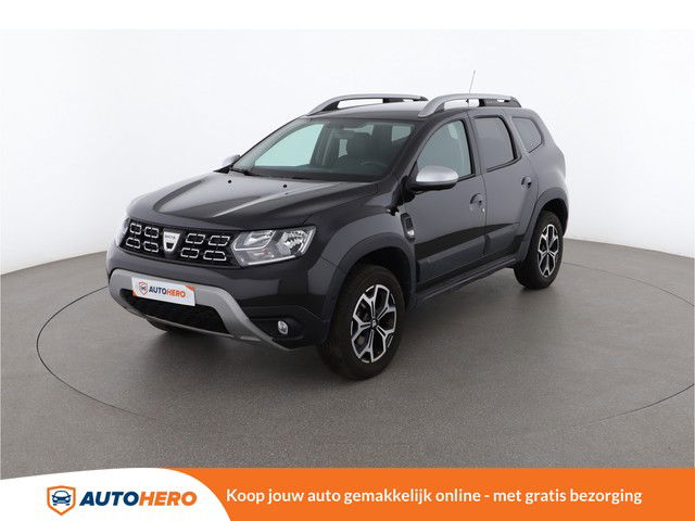 Dacia Duster 1.3 TCe Prestige 150PK CH56149 | Dealer Onderhouden | 360 Camera | Cruise | Stoelverwarming | Navi | Climate | Trekhaak | Leder | Dakrails |