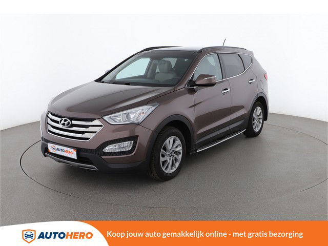 Hyundai Santa Fe 2.0 CRDi Style 2WD 150PK KA87137 | Dealer Onderhouden | Navi | Cruise | Climate | Camera | Handsfree | Bluetooth | Pano | Trekhaak | Dakrails | EURO 6 | Leder | Afdaalassistent | Stoelverwarming |