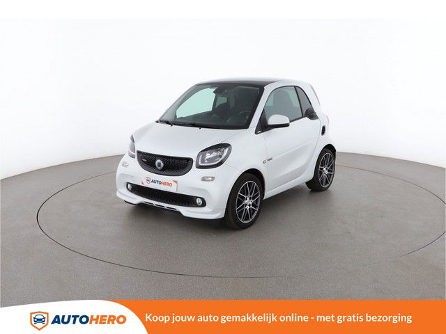 Smart fortwo 0.9 Turbo Brabus 110PK JB96085 | Navi | Cruise | Camera | Handsfree | Bluetooth | Pano | Parkeersensor Achter | Half Leder | Start/Stop | Licht- En Regensensor | Stoelverwarming | Bots Herkenning |