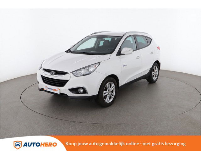 Hyundai ix35 1.6 Comfort 2WD 135PK ZD96533 | Navi | Cruise | Climate | Handsfree | Bluetooth | Camera | Licht- En Regensensor | Afdaalassistent | Half Leder | Start/Stop | Dakrails | Isofix |
