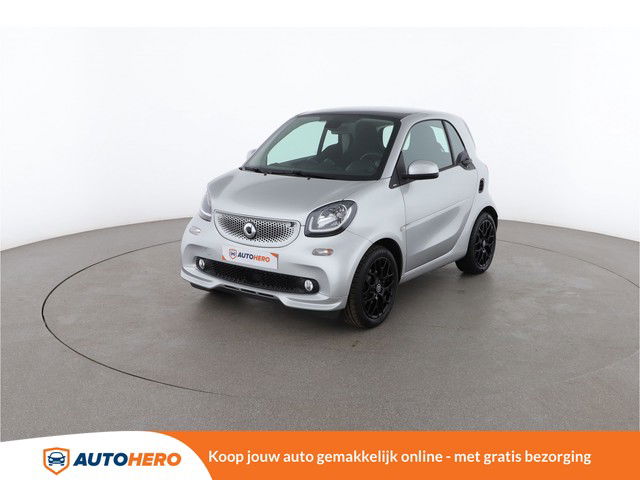 Smart fortwo 0.9 Turbo Basis Passion 90PK EK89399 | Navi | Cruise | Climate | Handsfree | Bluetooth | Camera | Pano | Stoelverwarming | Schakelmogelijkheid | LED Dagrijverlichting | Start/Stop |