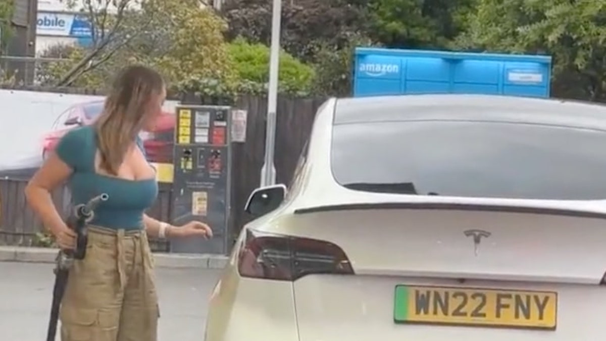 tesla-gas-woman-2.jpg