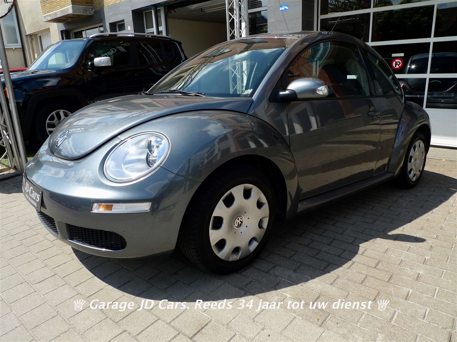 Volkswagen New Beetle 1.4i 39.000KM *3 JAAR/ANS GARANTIE* Als nieuw.